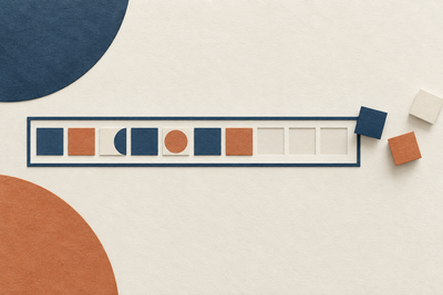 Blue and terracotta paper tiles approach empty spaces inside a closed rectangular frame.